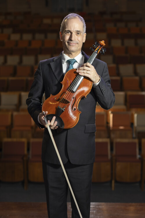 Dr. Zoltan Paulinyi with violin